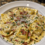 Homemade olive garden ravioli carbonara with extra large serving of creamy sauce and bacon