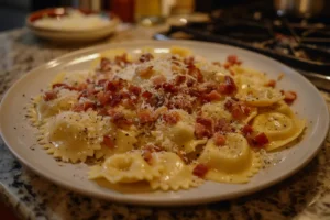 Large serving of creamy olive garden ravioli carbonara topped with bacon and parsley