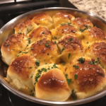 Mini grilled cheese Hawaiian rolls with gooey melted cheese and golden buttery tops