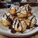 Profiteroles recipe with whipped cream and chocolate sauce