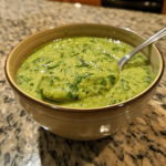 Peruvian green sauce (aji verde) in a bowl, creamy and vibrant green
