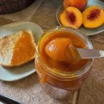 Amish Peach Butter spread on a slice of toast