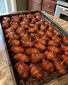 Bacon Wrapped Little Smokies Recipe fresh out of the oven on a baking sheet