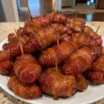 Bacon Wrapped Little Smokies Recipe served on a plate with toothpicks