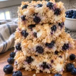 Single square of Blueberry Rice Krispies Treats on a plate