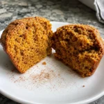 A split Low Carb Keto Pumpkin Muffin showing the moist inside texture