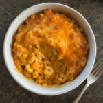A bowl of creamy Pumpkin Mac and Cheese ready to eat