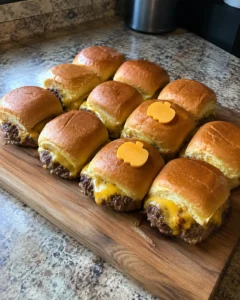 Pumpkin Sliders Recipe for Halloween served on a wooden platter