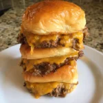 Close-up of Pumpkin Sliders Recipe for Halloween with melted cheese